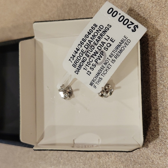 Diamond Star Stud Earrings (1/10 ct. t.w.) in Sterling Silver - Picture 2 of 7